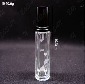 empty bottle of imported perfume recycled glass bottles black blue red pink green cap plastic and metal roll frog